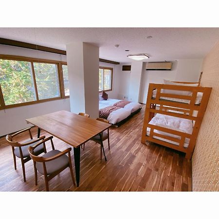 Nomad Hakuba Bed & Breakfast Екстериор снимка