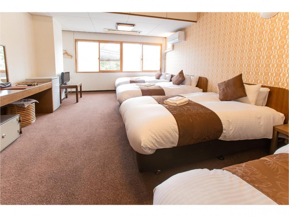 Nomad Hakuba Bed & Breakfast Екстериор снимка