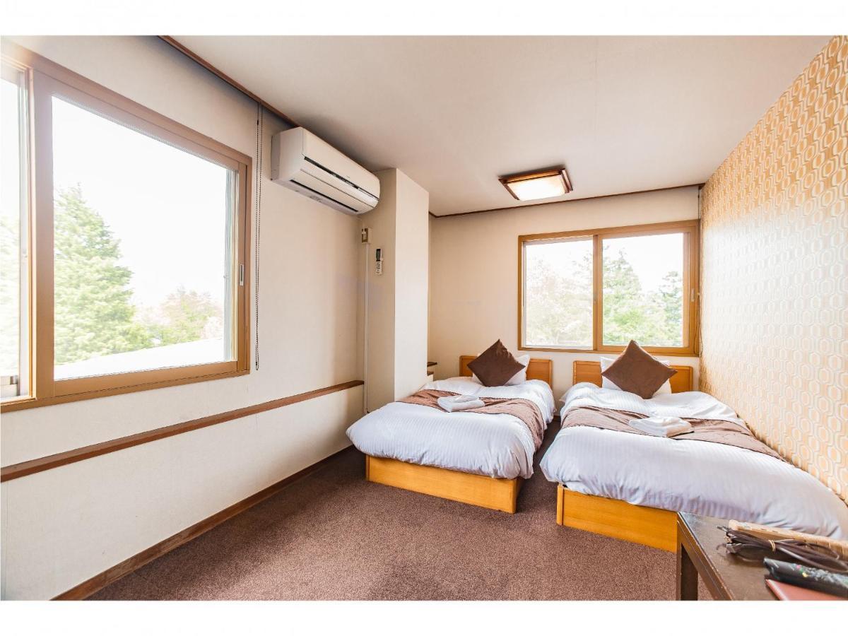 Nomad Hakuba Bed & Breakfast Екстериор снимка