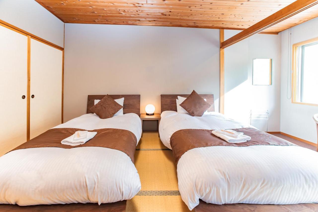 Nomad Hakuba Bed & Breakfast Екстериор снимка